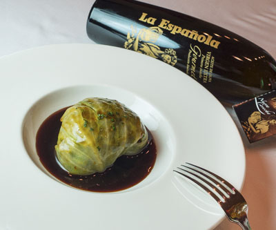 Cabbage stuffed with duck confit and vegetables